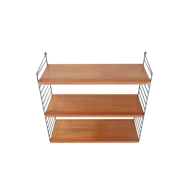 Original “String” wall shelf/shelving system, design: Kajsa & Nisse Strinning, 1949, Sweden. Not a reissue! Teak veneer....