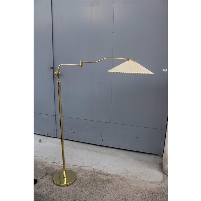 Floor Lamp in Brass from Interlux, Italy, 1950s, in Very Good conditions. Designed 1950 to 1959 This piece has an...