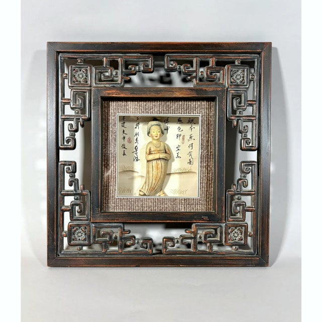A distinctive, circa 1980, Chinese-style shadowbox featuring a high-relief Tang Dynasty court maiden set against a...