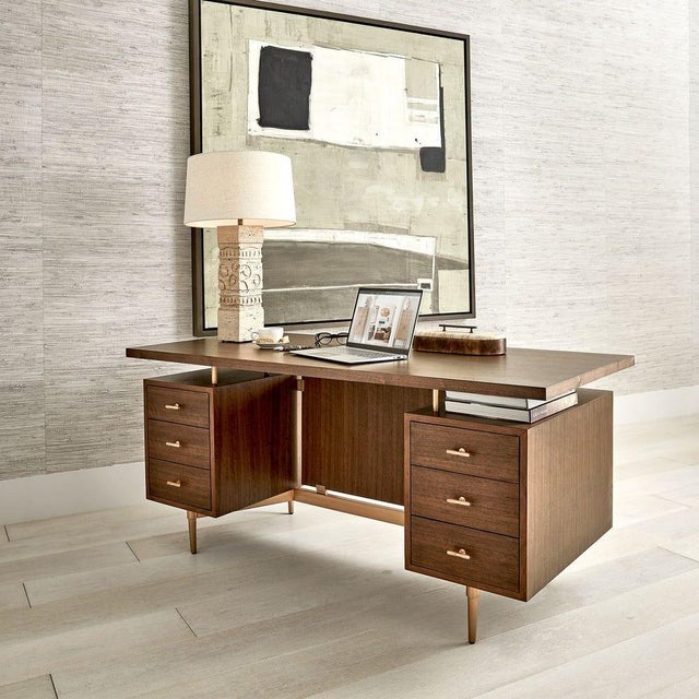 Influenced by mid 20th century architecture, the Enterprise Desk is a functional cosmopolitan statement. Made of mahogany...