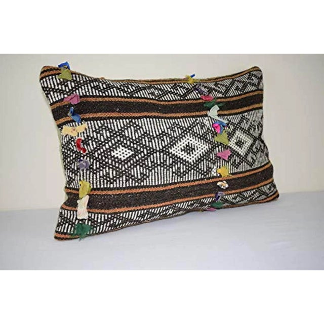 This handwoven kilim pillow is made from Anatolia and Middleast Kilim fragments. Each of our kilim pillow cover is cut...