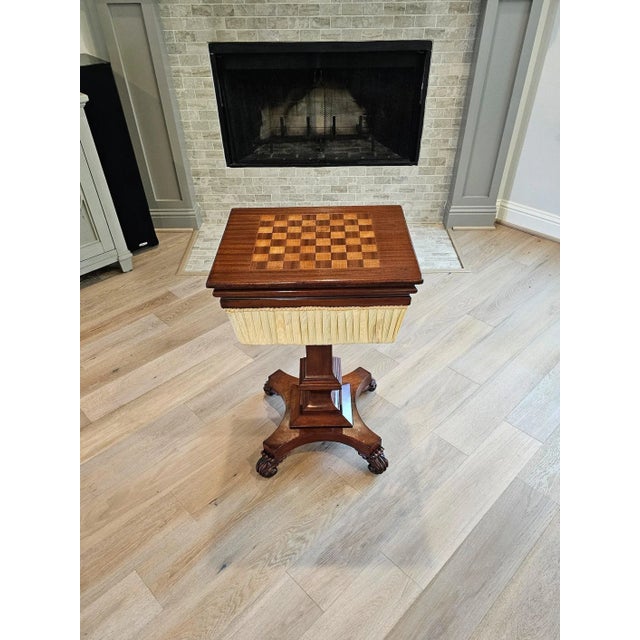 A period William IV English mahogany sewing stand work table with inlaid chessboard top. circa 1830s Combining...