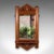 This is an antique hallway mirror. An English, walnut and bevelled glass valet or reception hall mirror, dating to the...
