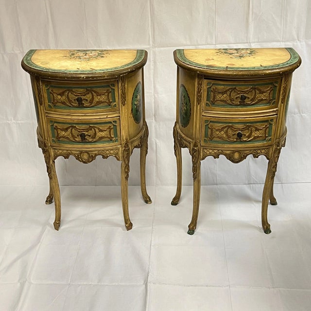 Pair of antique (early 20th century) demilune shaped side tables with drawers in the provincial French style, featuring...