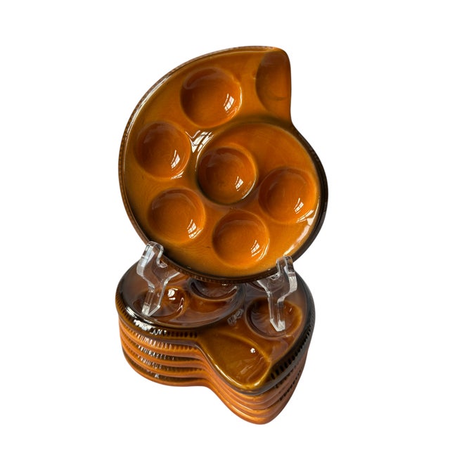 This is a charming set of six vintage honey amber / caramel glazed escargot plates. Each dish features six raised rounded...