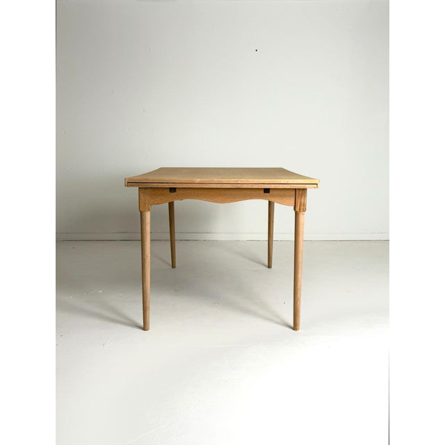 Extendable Oak Dining Table – Denmark, 1960s–70s Classic soaped oak dining table from 1960s–70s Denmark. Beautiful curved...