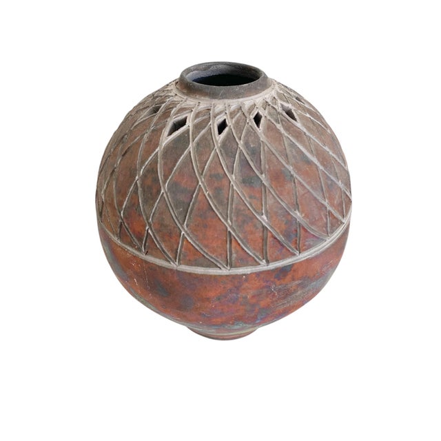 This vintage Steve Ernt Raku Studio Art Pottery vase features a metallic glaze with an abstract pattern, measuring 7...