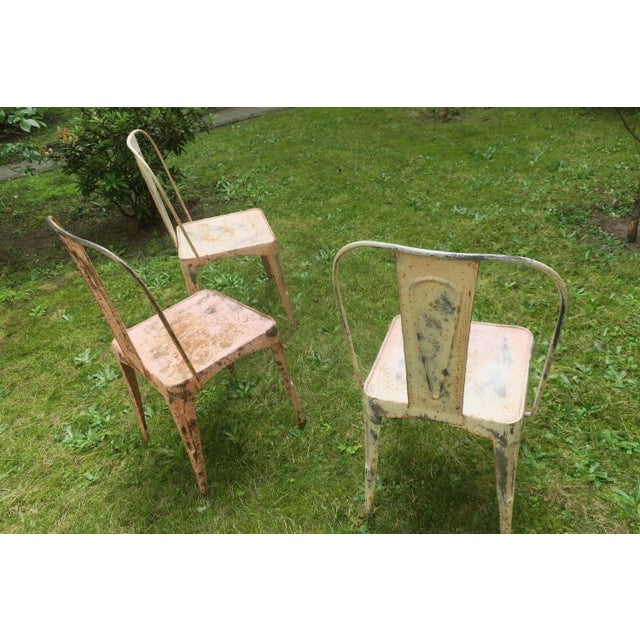 Set of 3 Tolix-style bistro or garden chairs dating from early 20th century, full of character, beautifully patinated,...