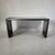 A custom console table from legendary designer Christian Liaigre (French, 1943-2020). Bespoke piece handmade from ebonized...