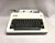 A 1970 Olympia portable typewriter, model SM8. The vintage typewriter is from the popular and sturdy Olympia SM series...