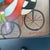 Signed Joyce Roybal Original Oil Painting Cyclists 9” X 7.5” Vintage Folk Art For Sale - Image 4 of 6