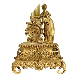 Clock in Gilt Bronze For Sale