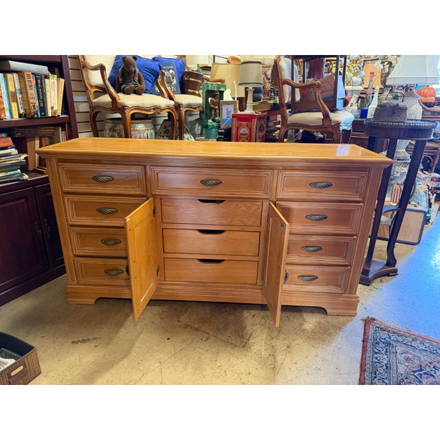 Elevate your space with this classic, high-quality traditional triple dresser by Wynwood Furniture. Crafted with a warm...
