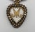 Exquisite 19th-century gilded metal Sacred Heart reliquary, featuring cut paste stones, mother-of-pearl inlay, and an...
