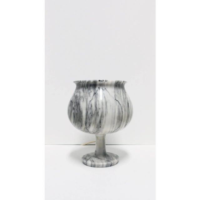 A very beautiful Italian marble table lamp, 70s Modern or Postmodern period, attributed to designer Angelo Mangiarotti,...