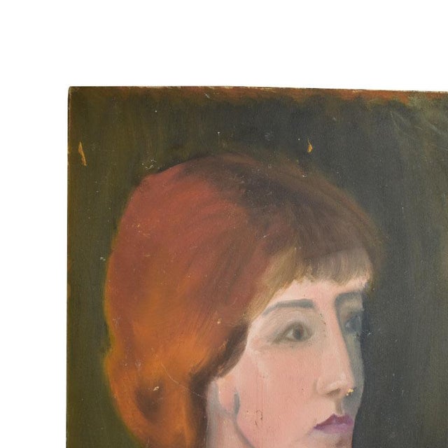 A portrait painting of a woman in blue on a masonite board. This piece is unsigned but was brought from the artists'...
