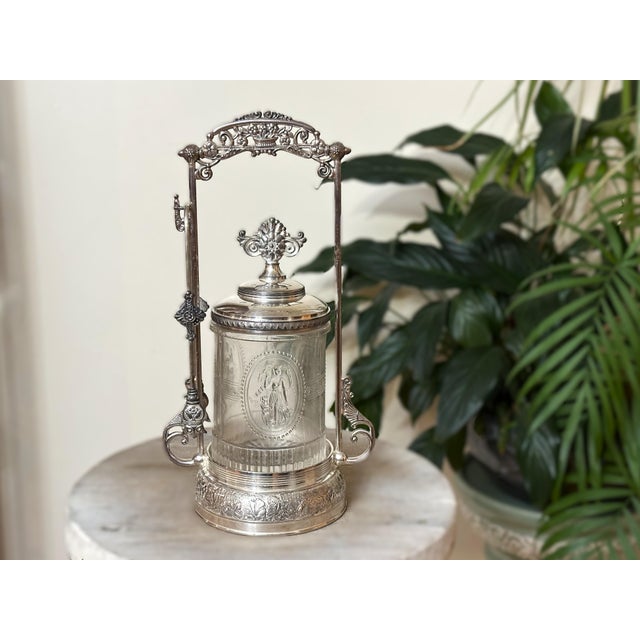 Late 19th-century Wilcox Silver Plate Co. Victorian pickle castor, Model No. 4624, with a molded figural glass liner,...