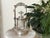 Late 19th-century Wilcox Silver Plate Co. Victorian pickle castor, Model No. 4624, with a molded figural glass liner,...
