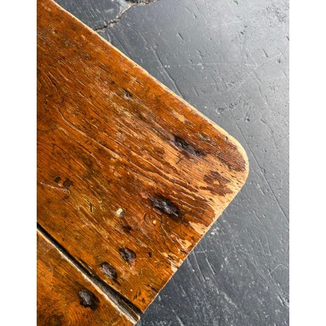 An exemplary primitive plank coffee table. Perfect patina throughout providing the lived-in charm and authenticity that...