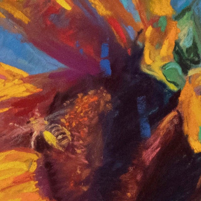 Vibrant sunflowers dominate the composition, their golden petals radiating warmth against a bright blue sky. The artist...