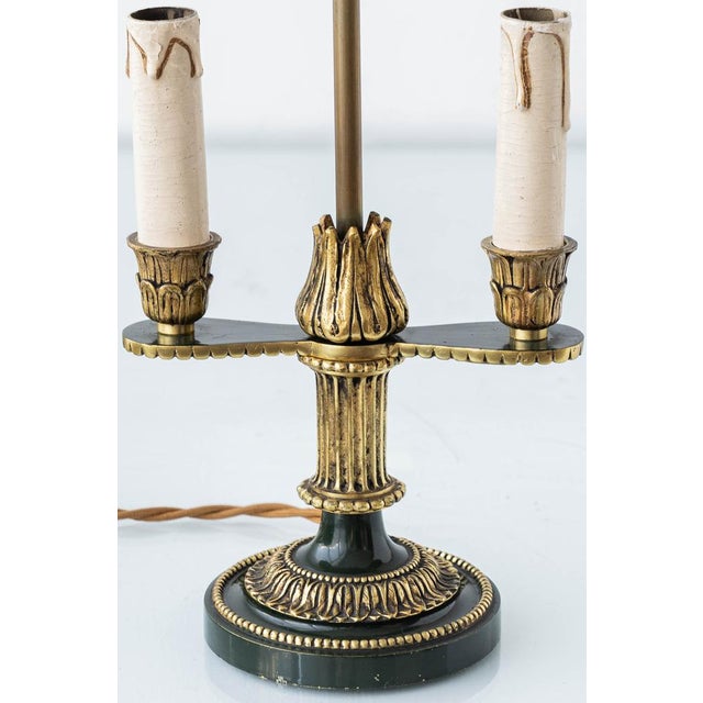 Exquisite vintage mid 20th-century French Empire bouillotte lamp featuring gilt brass/bronze mounts, dark green metal...