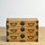 Traditional Japanese Tansu chest of drawers from the 1870s. Crafted during the late Meiji era (1868–1912), this piece...