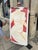 A striking modernist oil painting depicting a nude female figure in a dynamic and expressive composition. The work has a...