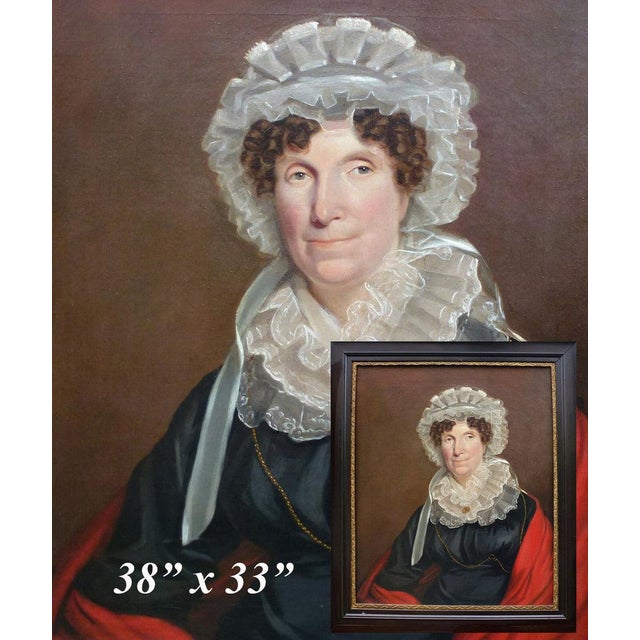 A truly stunning painting, this woman's fashion puts her c.1795-1810, and her slash of red scarf or shawl tells us she was...