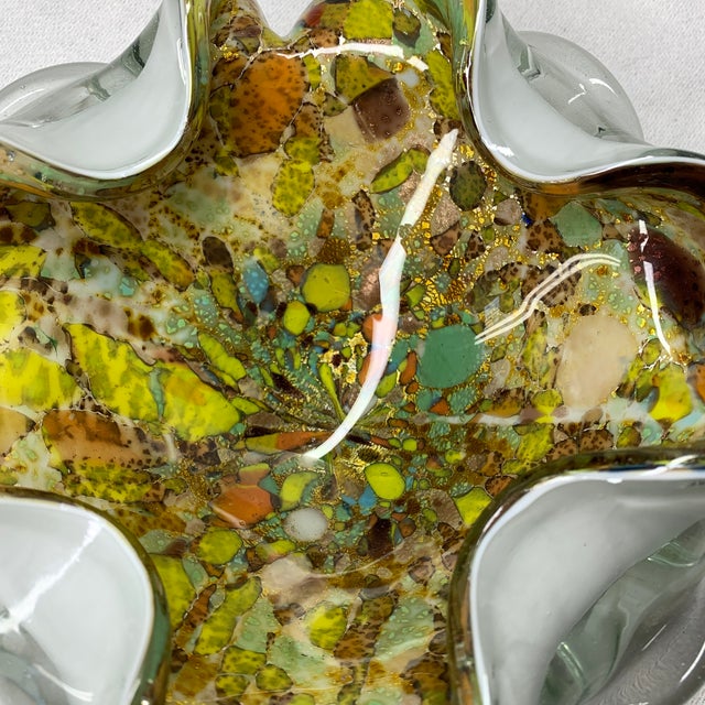 This vintage mid-century Italian art glass bowl is an authentic Murano "Tutti Frutti" free-form folded dish, likely...