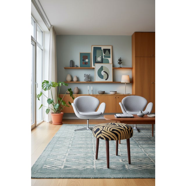 A round Danish stool that becomes the room's little jewel, an expressive pattern that catches the eye and adds both...