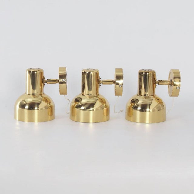 Swedish brass wall lights from the 1970s, set of three – adjustable vintage lighting with authentic scandinavian design....