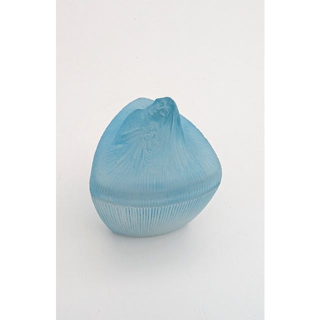 This exquisite 'tête de femme' powder box was designed by rené lalique for the pioneering perfumer françois coty. Produced...