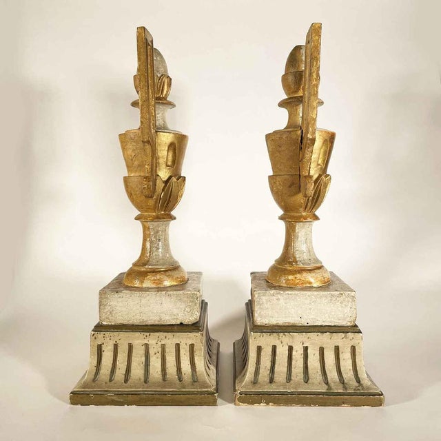 Pair of Empire Ivory and Gold Vases, 1800s. These two-handled vases are carved with Empire-style plant motifs and...