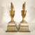 Pair of Empire Ivory and Gold Vases, 1800s. These two-handled vases are carved with Empire-style plant motifs and...