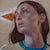 Beak by Joshua Lawyer | Oil on Wood Portrait of a Woman with a Pizza Slice For Sale