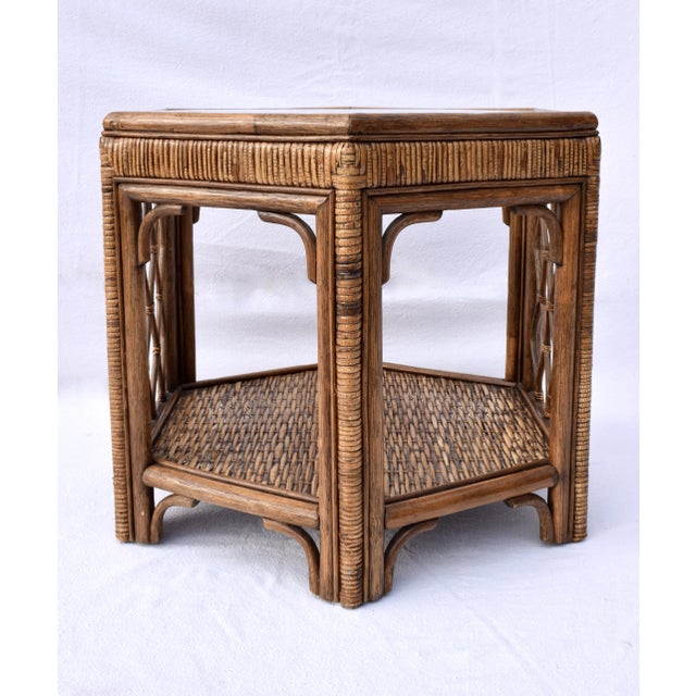 Pair of oversized two tier tables in bamboo & woven rattan with removable glass tops; Bloomingdales circa 1990s....