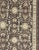 Measures: 3'9 x 5'10. This vintage Oushak was hand-knotted in Turkey during the 1940's. The charcoal/gray background dark...