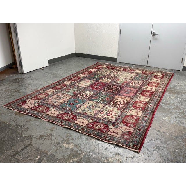 Design Plus Gallery presents a Vintage 8 Ft × 11 Ft Bakhtiari Style Garden Panel Area Rug. The design is arranged in a...