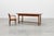 A handsome French oak dining table dating from around 1830, showcasing the timeless appeal of rural craftsmanship. The...