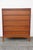 This magnificent Chest of Drawers is made of wood, walnut, and veneer. It was made by Lane Furniture, a well known company...