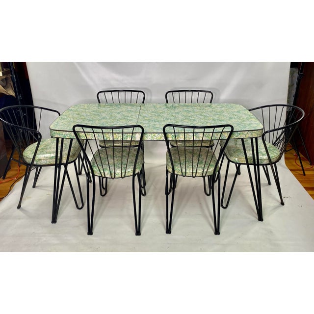 Mid-Century Modern Spaghetti Pattern Hairpin Leg Kitchen Set - 7 Pieces Table measurements are. H: 29” Depth: 30” Width:...