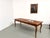 Large 1900s farmhouse table in solid cherry wood, featuring elegant curved legs and a scalloped apron. Completely restored...