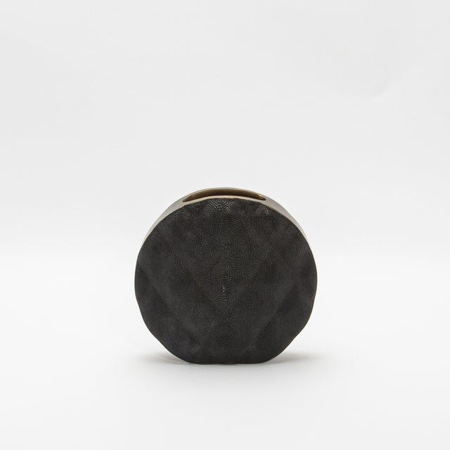 The Coco Vase by KIFU Paris is a statement piece that harmoniously blends modern luxury with timeless elegance. Crafted...