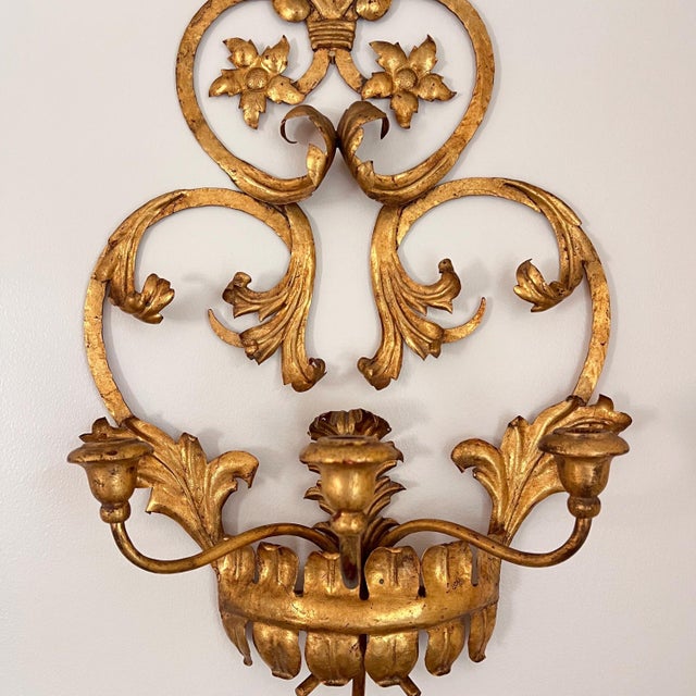 This is a beautiful vintage Italian gilt tole wall sconce that would be perfect as a dimensional addition to a gallery...
