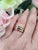 This is a lovely and elegant tri gold color ring featuring a unique free-form design and three bezel-set round brilliant...