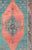 Measures: 5'2 x 8'7 Colorful Turkish medallion with tribal design in teal, coral, background and complemented by deep...
