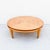 Expertly refinished mid century modern blonde mahogany cocktail table with polished nickel sabots. Produced by Brown...