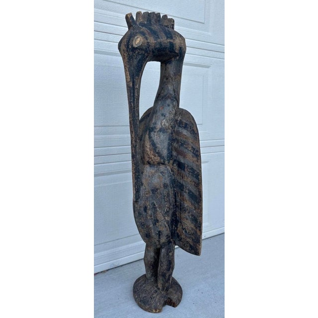 Antique Senufo Hornbill Sculpture (Porpianong), Côte d’Ivoire – 40” Tall Description A striking and highly sculptural...