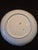 This is an antique Bavarian porcelain display plate or shallow bowl featuring a scalloped, molded rim and an asymmetrical,...