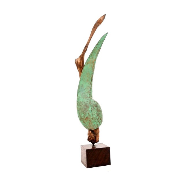 A wonderful vintage bronze and driftwood sculpture by a. Altmann. It was made in london, england and dates from the...